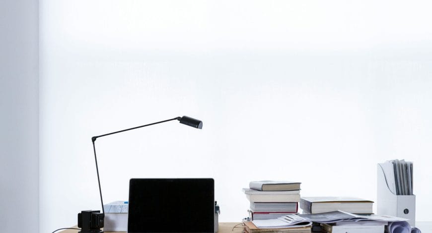 mac book pro on top of table