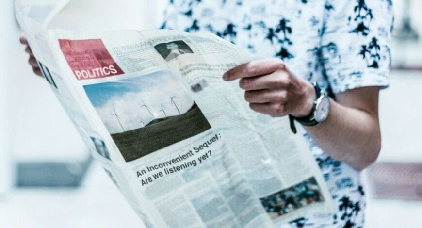 Person reading a newspaper